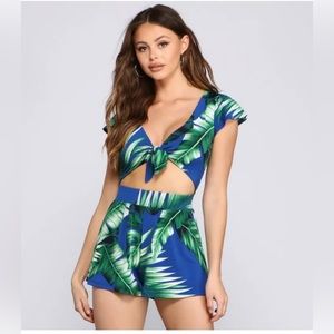 Tropical floral romper with front tie.